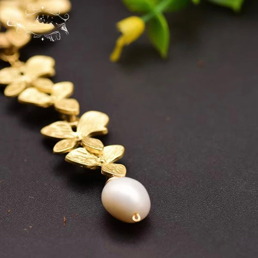 Natural  Pearl Sweater Necklace — a custom, handmade vintage piece featuring an 18k gold-plated long chain within fine jewelry.